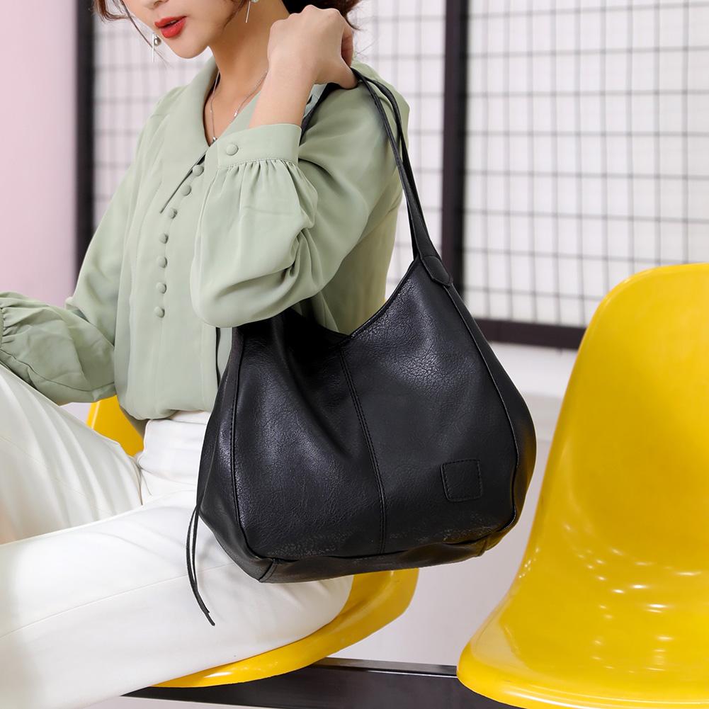 LuxeSlouch – Vegane Slouchy Schultertasche aus Leder