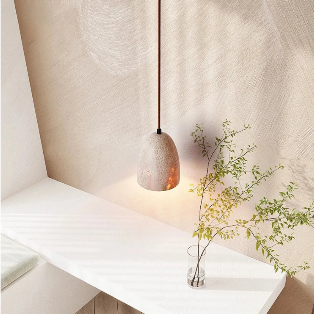 TerraLume – Pendelleuchte mit Natursteinstruktur und warmer Glut