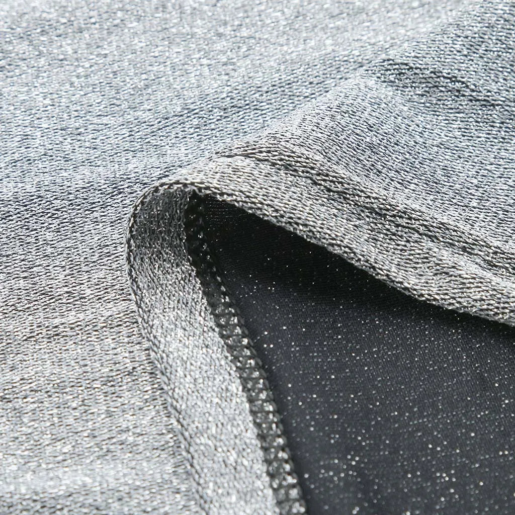 Luna - Körperbetontes Kleid mit silbernen Pailletten und Fransenärmeln