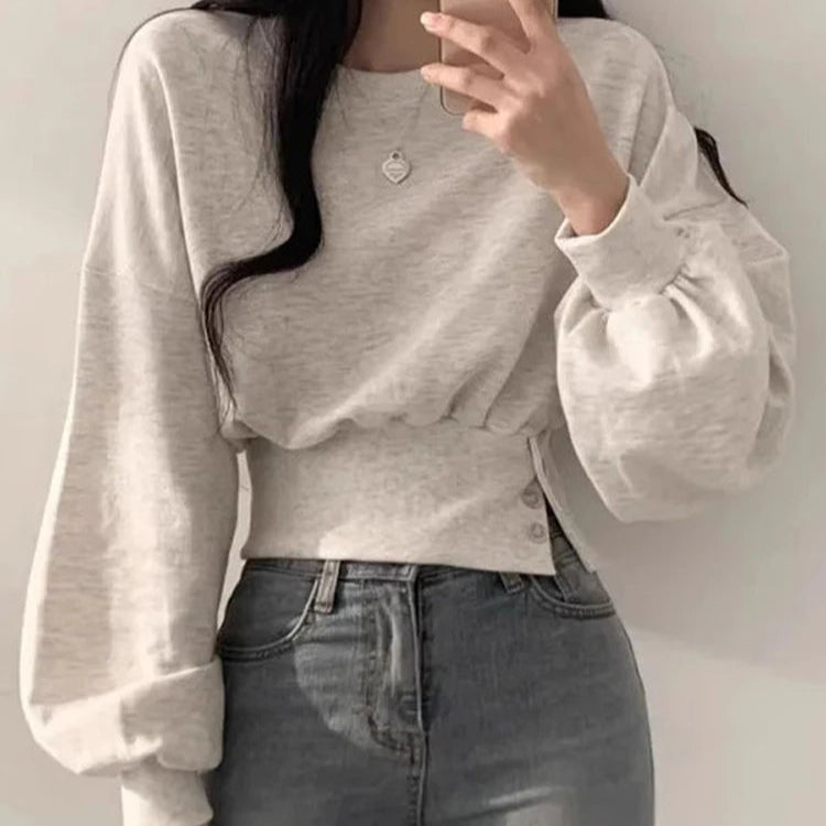 Ava Lässiges Langarm-Sweatshirt mit Gürtel- und Knopfdetail
