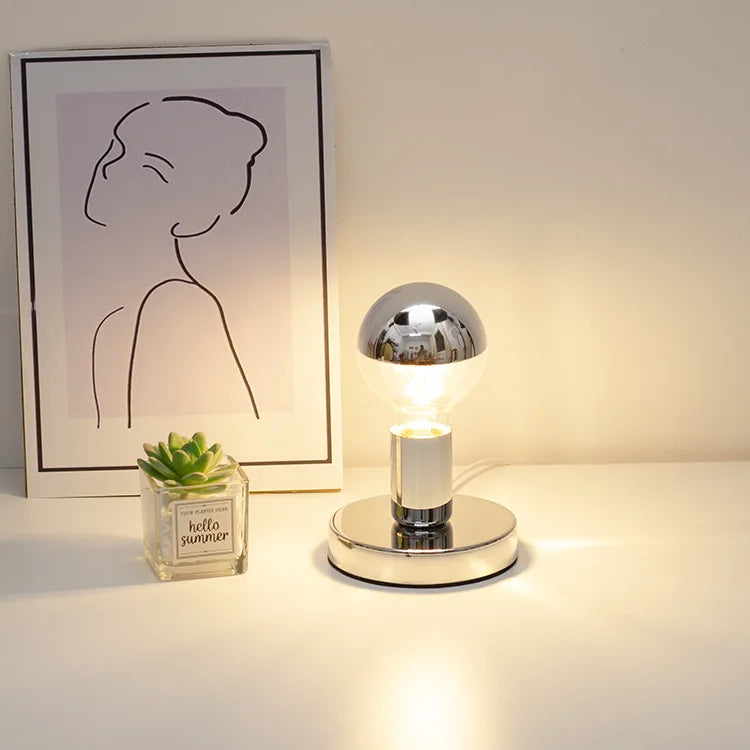 LumiSphere – Moderne Tischlampe mit Schirm aus Spiegelglas